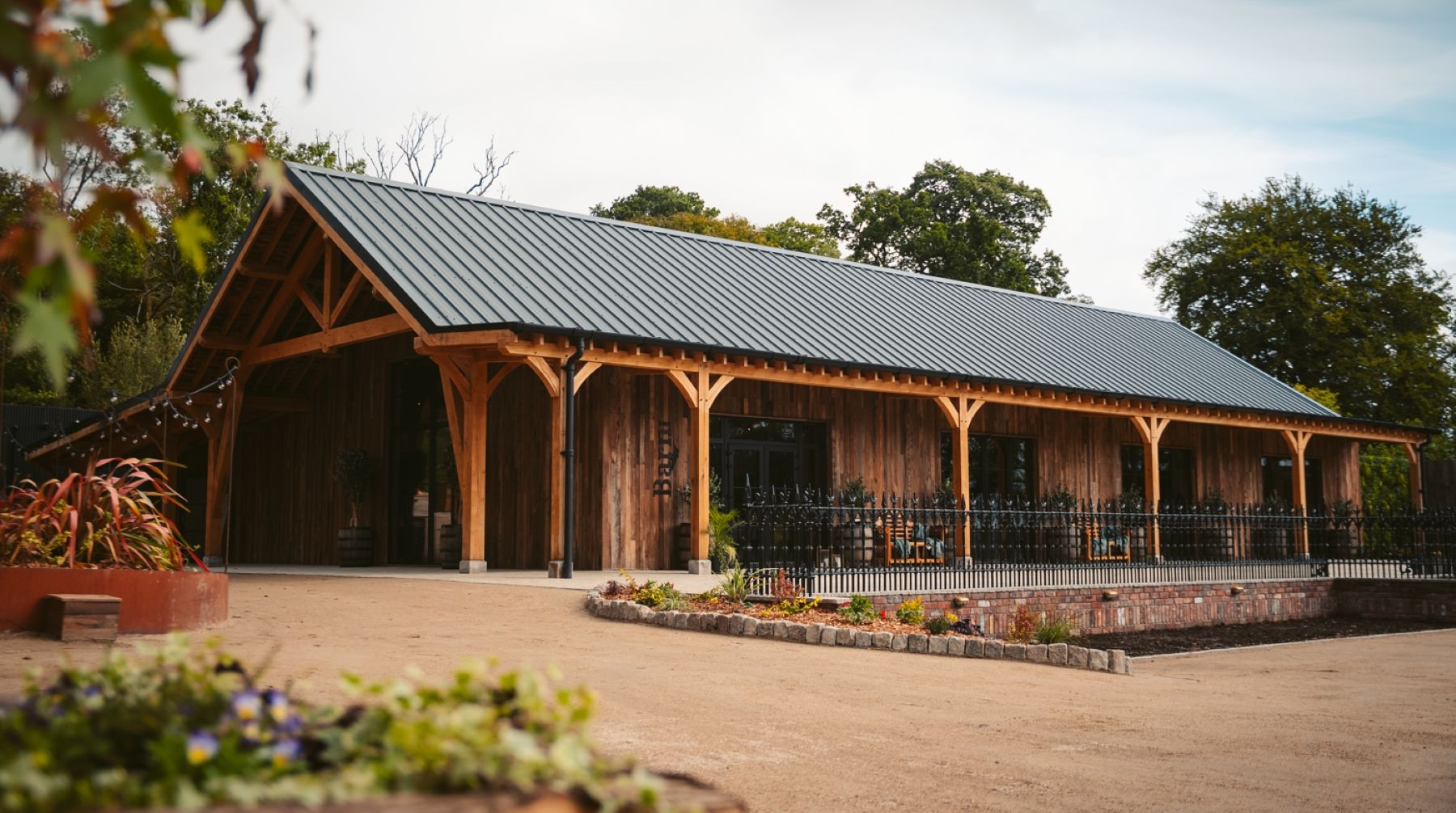 The timber Hideaway Barn with its long veranda