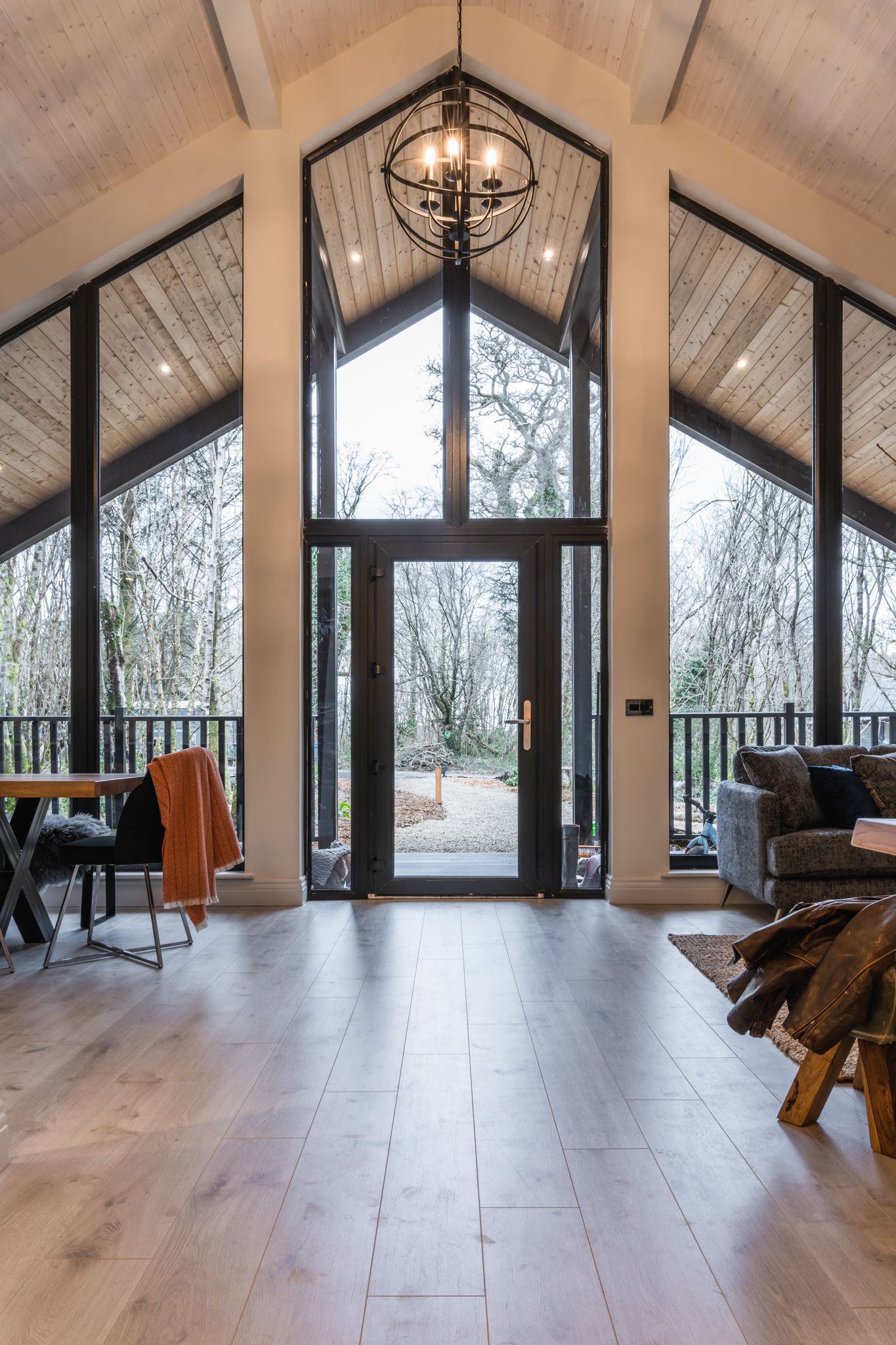 Living space glazed to the woodland through the gable