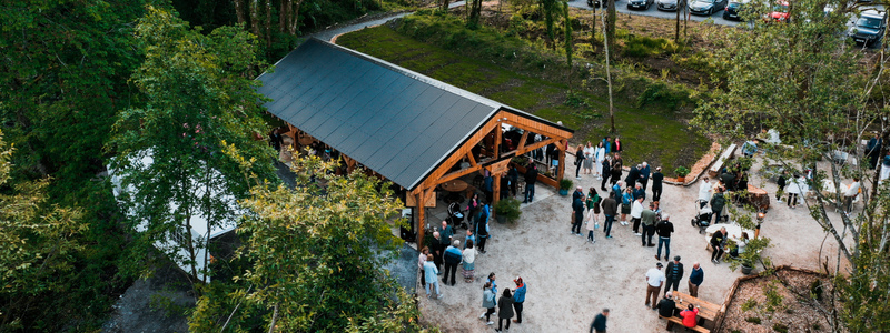 Guests gathered at the Cedaroo timber pavilion in the wood